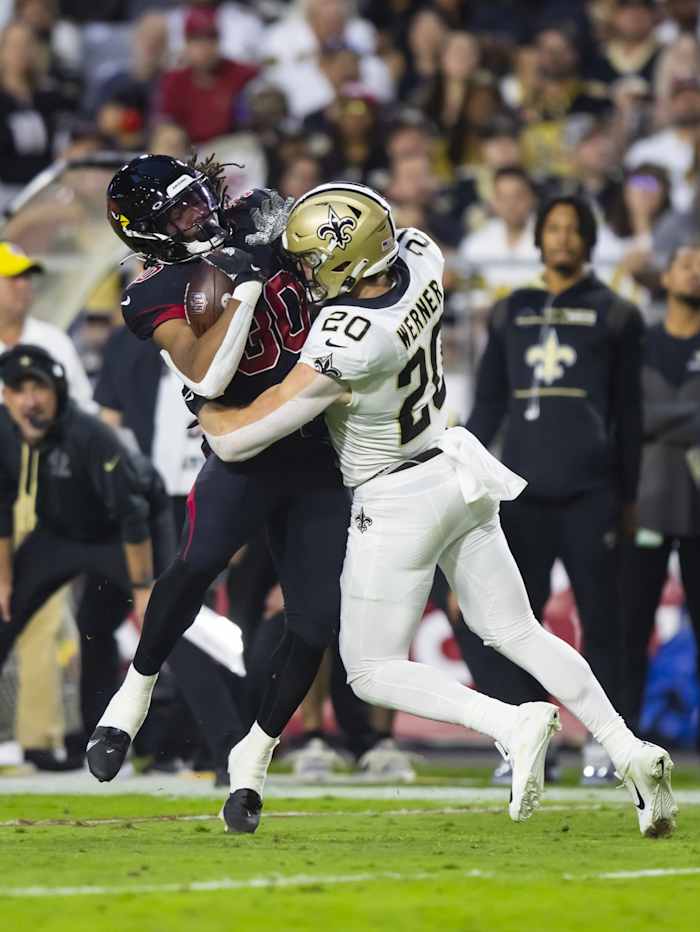 New Orleans Saints linebacker Pete Werner (20) tackles Arizona Cardinals running back Keaontay Ingram (30). Mandatory Credit: Mark J. Rebilas-USA TODAY